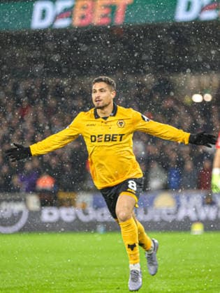 Joao Gomes (8 Wolves) celebrates scoring the first goal for Wolves during the Premier League football match between Wolverhampton Wanderers and Aston Villa at Molineux stadium in Wolverhampton, England Copyright: xNataliexMincher SPPx Sportspressphoto_SPR98351