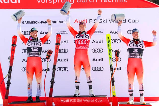 Sport Bilder des Tages ALPINE SKIING - FIS WC Garmisch-Partenkirchen GARMISCH-PARTENKIRCHEN,GERMANY,28.FEB.26 - ALPINE SKIING - FIS World Cup, downhill, men. Image shows the rejoicing of Alexis Monney (SUI), Marco Odermatt (SUI) and Stefan Rogentin (SUI). Keywords: trophy.  GEPAxpictures xHaraldxSteiner