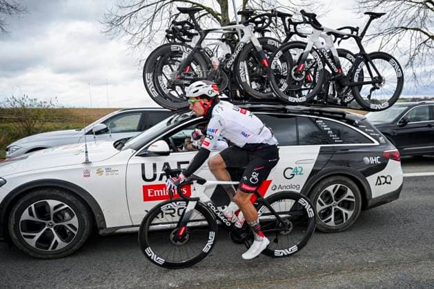 Omloop Het Nieuwsblad 2026 Cycling Race NINOVE, BELGIUM - FEBRUARY 28 : Rider of Team UAE Team Emirates - XRG with the team car during the 81th edition of Omloop Het Nieuwsblad an UCI World Tour 1.UWT one day cycling road race for Men Elite of km with start in Ghent and finish in Ninove on February 28, 2026 in Ninove, Belgium, 28 02 2026 ( Motordriver Kenny Verfaillie - Ninove Belgium  Copyright: xNicoxVereeckenx