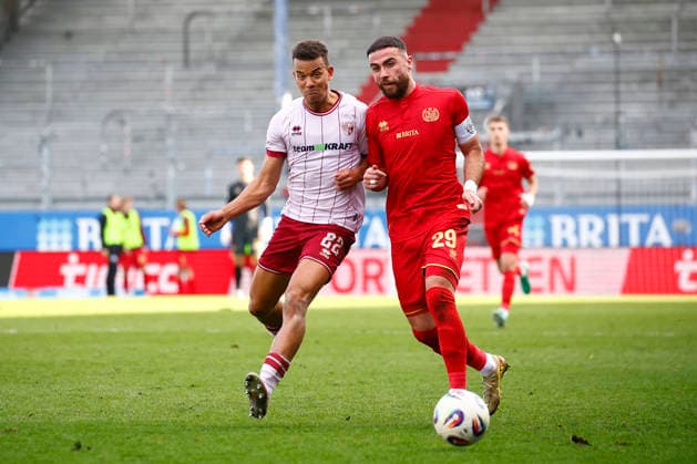 28.02.2026, xavx, Fussball 3.Liga, SV Wehen Wiesbaden - FC Ingolstadt 04 v.l. Marcel Costly (FC Ingolstadt 04), Fatih Kaya (SV Wehen Wiesbaden) (DFL DFB REGULATIONS PROHIBIT ANY USE OF PHOTOGRAPHS as IMAGE SEQUENCES and or QUASI-VIDEO) Wiesbaden