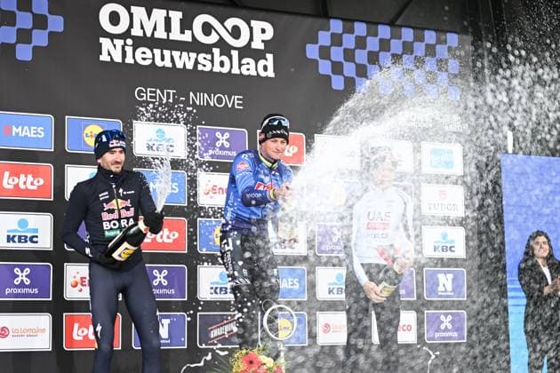 Dutch Mathieu van der Poel of Alpecin-Premier Tech celebrates on the podium after winning the 81st edition of the men s one-day cycling race Omloop Het Nieuwsblad (UCI World Tour), the opening race of the Flemish one-day classics season, 207,6 km from Gent to Ninove, Saturday 28 February 2026. MAARTENxSTRAETEMANS  x165959094x