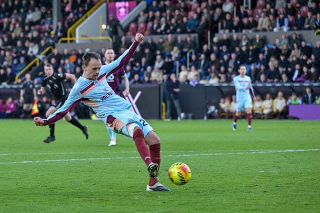 28th February 2026; Turf Moor, Burnley, Lancashire, England; Premier League Football, Burnley versus Brentford; Mikkel Damsgaard of Brentford shoots and scores in the 93rd minute to go 3-4  LeexDurkin