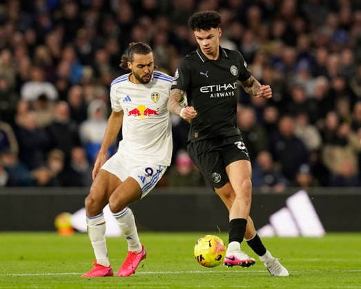 Leeds, England, 28th February 2026. Dominic Calvert-Lewin of Leeds United (l) and Nico O™Reilly of Manchester City (r) during the Leeds United vs Manchester City Premier League match at Elland Road, Leeds. Picture credit should read: Andrew Yates Sportimage EDITORIAL USE ONLY. No use with unauthorised audio, video, data, fixture lists, club league logos or live services. Online in-match use limited to 120 images, no video emulation. No use in betting, games or single club league player publications. SPI_043_AY_Leeds_Man_City SPI-4565-0043