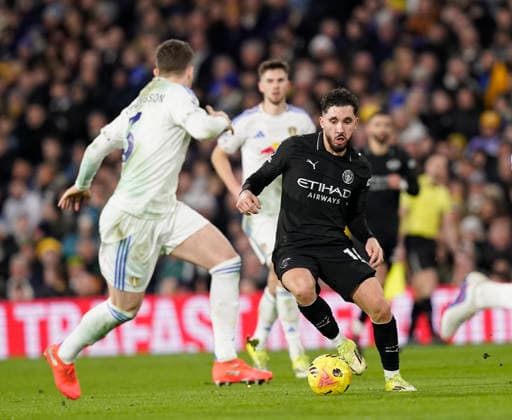 Leeds, England, 28th February 2026. Rayan Cherki of Manchester City looks for space during the Leeds United vs Manchester City Premier League match at Elland Road, Leeds. Picture credit should read: Andrew Yates Sportimage EDITORIAL USE ONLY. No use with unauthorised audio, video, data, fixture lists, club league logos or live services. Online in-match use limited to 120 images, no video emulation. No use in betting, games or single club league player publications. SPI_077_AY_Leeds_Man_City SPI-4565-0077