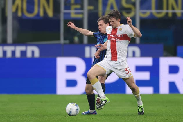 Milan, Italy, 28th February 2026. Morten Frendrup of Genoa CFC is fouled by Nicolo Barella of FC Internazionale during the Internazionale vs Genoa Serie A match at Giuseppe Meazza, Milan. Picture credit should read: Jonathan Moscrop Sportimage EDITORIAL USE ONLY. No use with unauthorised audio, video, data, fixture lists, club league logos or live services. Online in-match use limited to 120 images, no video emulation. No use in betting, games or single club league player publications. SPI_006_INTER_GENOA_ SPI-4553-0006