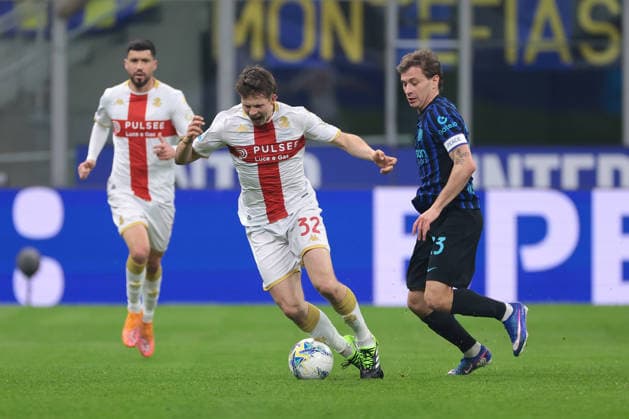Milan, Italy, 28th February 2026. Aaron Martin of Genoa CFC looks on as team mate Morten Frendrup is fouled by Nicolo Barella of FC Internazionale during the Internazionale vs Genoa Serie A match at Giuseppe Meazza, Milan. Picture credit should read: Jonathan Moscrop Sportimage EDITORIAL USE ONLY. No use with unauthorised audio, video, data, fixture lists, club league logos or live services. Online in-match use limited to 120 images, no video emulation. No use in betting, games or single club league player publications. SPI_007_INTER_GENOA_ SPI-4553-0007