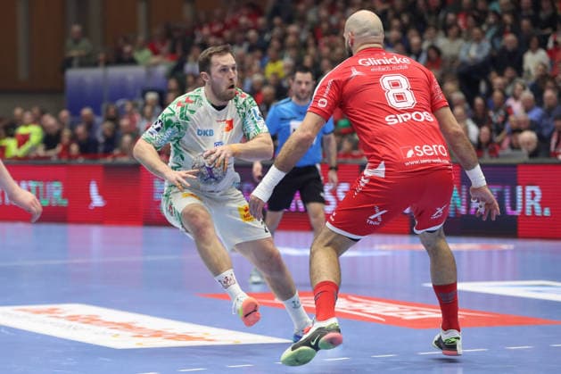 28.02.2026, xgox, Handball - Daikin HBL MT Melsungen - SC Magdeburg emspor, v.l. Albin Lagergren (Magdeburg, 21) , Adrian Sipos (Melsungen, 8) Zweikampf, Duell, Kampf, tackle Kassel