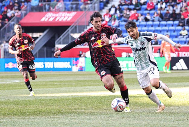 February 28, 2026, Harrison, New Jersey, USA: New York Red Bulls forward Cade Cowell (7) and New England Revolution midfielder Carles Gil (10) battle for the ball at Sports Illustrated Stadium. Harrison USA - ZUMAs325 20260228_zsp_s325_015 Copyright: xJessxStilesx