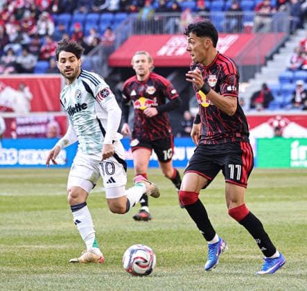 February 28, 2026, Harrison, New Jersey, USA: New York Red Bulls forward Jorge Ruvalcaba (11) controls the ball while New England Revolution midfielder Carles Gil (10) chases at Sports Illustrated Stadium. Harrison USA - ZUMAs325 20260228_zsp_s325_039 Copyright: xJessxStilesx