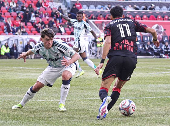 February 28, 2026, Harrison, New Jersey, USA: New England Revolution defender Ilay Feingold (12) and New York Red Bulls forward Jorge Ruvalcaba (11) battle for the ball at Sports Illustrated Stadium. Harrison USA - ZUMAs325 20260228_zsp_s325_048 Copyright: xJessxStilesx