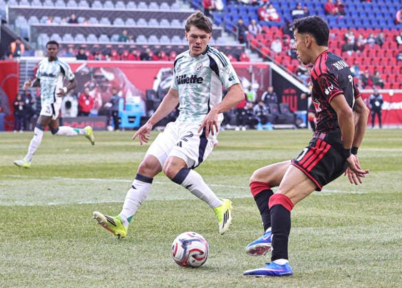 February 28, 2026, Harrison, New Jersey, USA: New England Revolution defender Ilay Feingold (12) and New York Red Bulls forward Jorge Ruvalcaba (11) battle for the ball at Sports Illustrated Stadium. Harrison USA - ZUMAs325 20260228_zsp_s325_057 Copyright: xJessxStilesx