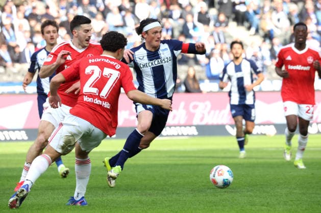 DEU, DFL, 2. FBL, Hertha BSC vs. 1.FC Nuernberg, 01.03.2026, Berliner Olympiastadion, Berlin, DEU, DFL, 2. FBL, Hertha BSC vs. 1.FC Nuernberg, im Bild Fabian Reese (Hertha BSC Berlin 11), n24 , JUSTIN VON DER HITZ (1.FC Nuernberg 27) DFL - regulations prohibit any use of Photographs as image sequences and or quasi-video
