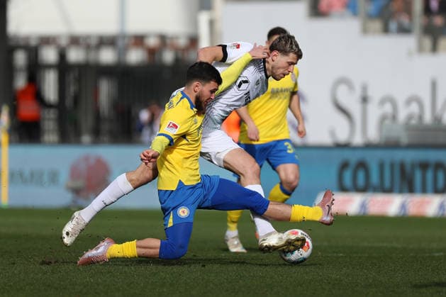 Braunschweig vs. Münster, 2. BL Braunschweig, 01.03.2026, Fußball, Herren, 2. BL, Saison 2025 2026, Eintracht Braunschweig vs. SC Preußen Münster: Mehmet Can Aydin (Eintracht Braunschweig) , Imad Rondic (Münster) (DFL DFB REGULATIONS PROHIBIT ANY USE OF PHOTOGRAPHS as IMAGE SEQUENCES and or QUASI-VIDEO) Stadion an der Hamburger Straße Niedersachsen Deutschland