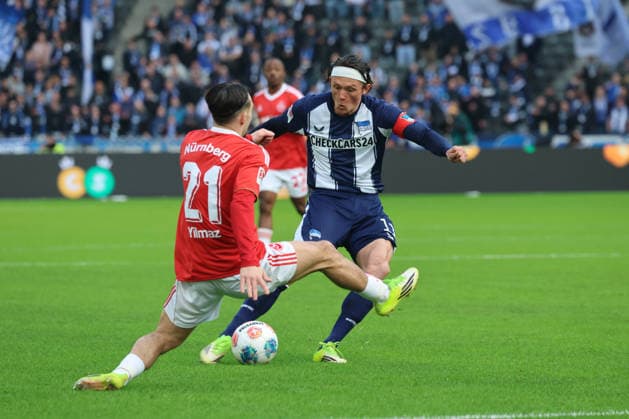 BERLIN, GERMANY - MARCH 1: Fabian Reese (Hertha, 11) shooting at the goal against Berkay YÄ±lmaz (Nürnberg, 21), during the Bundesliga match between Hertha BSC - 1. FC Nürnberg at Olympiastadion on matchday 24 of the 2. Bundesliga on March 1, 2026 in Berlin, Germany. DFL REGULATIONS PROHIBIT ANY USE OF PHOTOGRAPHS AS IMAGE SEQUENCES AND OR QUASI-VIDEO. Berlin Germany Copyright: xO.Frankex