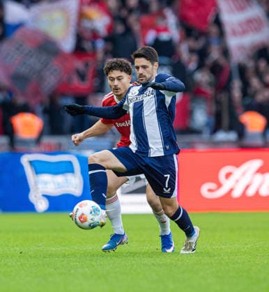 Fussball, Herren, Saison 2025 2026, 2. Bundesliga (24. Spieltag), Hertha BSC - 1. FC Nürnberg, v.l. Justin von der Hitz (Nürnberg), Josip Brekalo (Hertha BSC), 01.03. 2026,