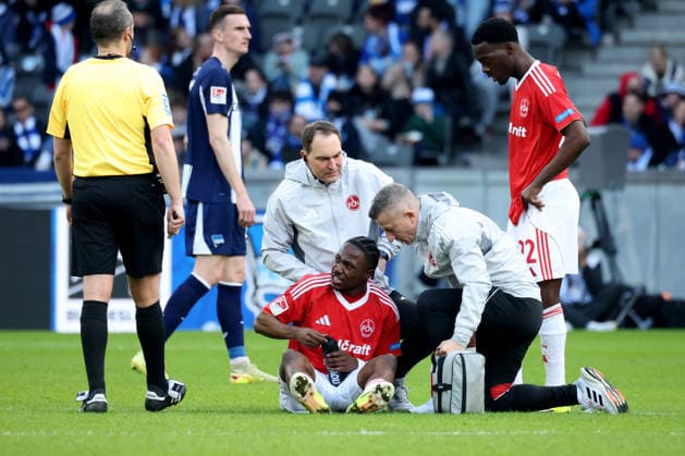 DEU, DFL, 2. FBL, Hertha BSC vs. 1.FC Nuernberg, 01.03.2026, Berliner Olympiastadion, Berlin, DEU, DFL, 2. FBL, Hertha BSC vs. 1.FC Nuernberg, im Bild MOHED ALI ZOMA (1.FC Nuernberg 23), veerletzt DFL - regulations prohibit any use of Photographs as image sequences and or quasi-video
