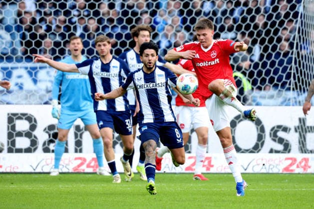DEU, DFL, 2. FBL, Hertha BSC vs. 1.FC Nuernberg, 01.03.2026, Berliner Olympiastadion, Berlin, DEU, DFL, 2. FBL, Hertha BSC vs. 1.FC Nuernberg, im Bild Kevin Sessa (Hertha BSC Berlin 8), FINN BECKER (1.FC Nuernberg 25) DFL - regulations prohibit any use of Photographs as image sequences and or quasi-video