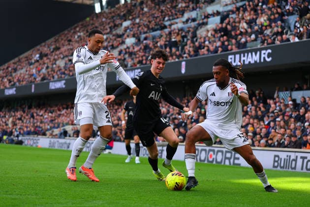 1st March 2026; Craven Cottage, Fulham, London, England; Premier League Football, Fulham versus Tottenham Hotspur; Archie Gray of Tottenham Hotspur under pressure from Kenny Tete and Alex Iwobi of Fulham  JPxFletcher Content restricted for UK based newspaper