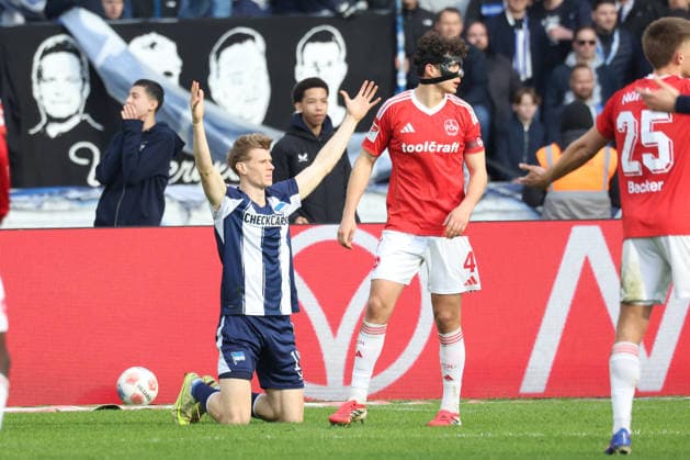 DEU, DFL, 2. FBL, Hertha BSC vs. 1.FC Nuernberg, 01.03.2026, Berliner Olympiastadion, Berlin, DEU, DFL, 2. FBL, Hertha BSC vs. 1.FC Nuernberg, im Bild Luca Schuler (Hertha BSC Berlin 18), Gruber, Fabio (1.FC Nuernberg 4) DFL - regulations prohibit any use of Photographs as image sequences and or quasi-video