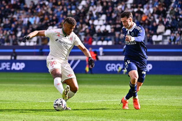 FOOTBALL : Paris FC vs Nice - Ligue 1 - 01 03 2026 Kevin Carlos ( 90 - Nice ) and Diego Coppola ( 42 - PFC ) during the Ligue 1 match between Paris FC and OGC Nice at Stade Jean Bouin on March 01, 2026 in Paris, France. ( Photo by Federico Pestellini PsnewZ ) - ParisFrance  Copyright: xFedericoxPestelinix