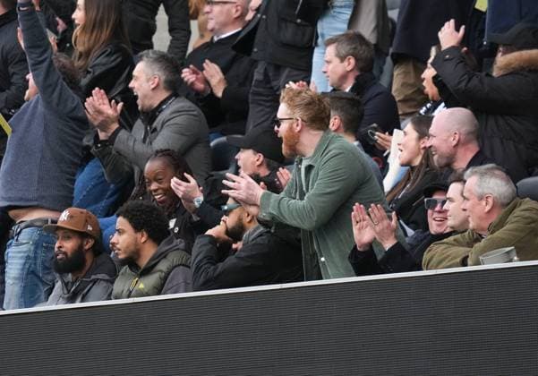 Rapper AJ Tracey in the stands, near to comedian Michael McKintyre, reacts as Fulham scores the opening goal Fulham v Tottenham Hotspur, Premier League, Football, Craven Cottage, London, UK - 01 Mar 2026London Craven Cottage United Kingdom EDITORIAL USE ONLY No use with unauthorised audio, video, data, fixture lists, club league logos or live services. Online in-match use limited to 120 images, no video emulation. No use in betting, games or single club league player publications. Copyright: xJedxLeicester Shutterstockx 16716302g