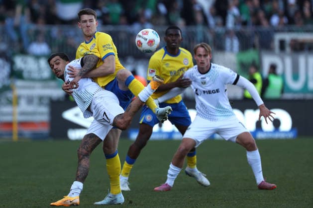 Braunschweig vs. Münster, 2. BL Braunschweig, 01.03.2026, Fußball, Herren, 2. BL, Saison 2025 2026, Eintracht Braunschweig vs. SC Preußen Münster: Oliver Batista Meier (Münster), Florian Flick (Eintracht Braunschweig) (DFL DFB REGULATIONS PROHIBIT ANY USE OF PHOTOGRAPHS as IMAGE SEQUENCES and or QUASI-VIDEO) Stadion an der Hamburger Straße Niedersachsen Deutschland