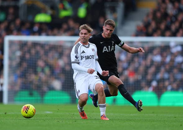 1st March 2026; Craven Cottage, Fulham, London, England; Premier League Football, Fulham versus Tottenham Hotspur; Emile Smith Rowe of Fulham under pressure from Micky van de Ven of Tottenham Hotspur  JPxFletcher Content restricted for UK based newspaper