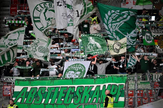 Fanblock, Fans, Fankurve, Flaggen, Fahnen, Stimmung, stimmungsvoll VfL Wolfsburg VfB Stuttgart vs VfL Wolfsburg WOB 01.03.2026 DFL REGULATIONS PROHIBIT ANY USE OF PHOTOGRAPHS AS IMAGE SEQUENCES AND OR QUASI-VIDEO VfB Stuttgart vs VfL Wolfsburg WOB