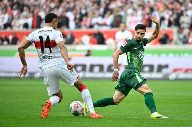 Zweikampf, Aktion Luca Jaquez VfB Stuttgart (14) gegen Mohamed Amoura VfL Wolfsburg (09) VfB Stuttgart vs VfL Wolfsburg WOB 01.03.2026 DFL REGULATIONS PROHIBIT ANY USE OF PHOTOGRAPHS AS IMAGE SEQUENCES AND OR QUASI-VIDEO VfB Stuttgart vs VfL Wolfsburg WOB