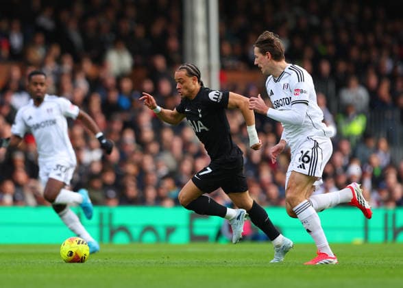 1st March 2026; Craven Cottage, Fulham, London, England; Premier League Football, Fulham versus Tottenham Hotspur; Xavi Simons of Tottenham Hotspur under pressure from Sander Berge of Fulham  JPxFletcher Content restricted for UK based newspaper