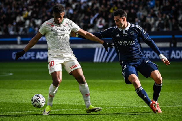 March 1, 2026, Paris, France, France: Kevin CARLOS of Nice and Diego COPPOLA of Paris FC during the Ligue 1 match between Paris FC and OGC Nice at Jean-Bouin Stadium on March 01, 2026 in Paris, France. Paris FC V OGC Nice - Ligue 1  - ZUMAm308 20260301_zsp_m308_005 Copyright: xMatthieuxMirvillex