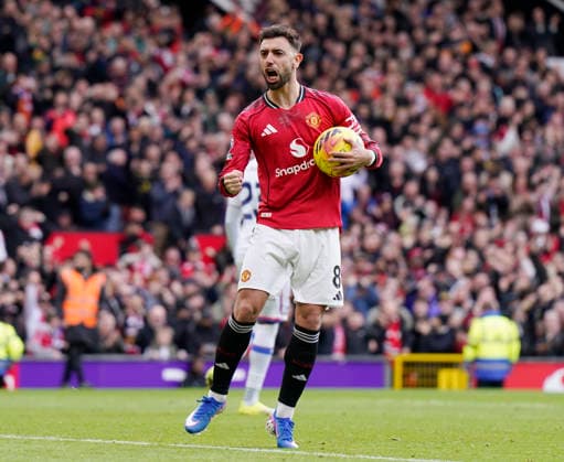 Manchester, England, 1st March 2026. Bruno Fernandes of Manchester United, ManU celebrates scoring from the penalty spot to make it 1-1 during the Manchester United vs Crystal Palace Premier League match at Old Trafford, Manchester. Picture credit should read: Andrew Yates Sportimage EDITORIAL USE ONLY. No use with unauthorised audio, video, data, fixture lists, club league logos or live services. Online in-match use limited to 120 images, no video emulation. No use in betting, games or single club league player publications. SPI_044_AY_Man_Utd_Palace SPI-4566-0044