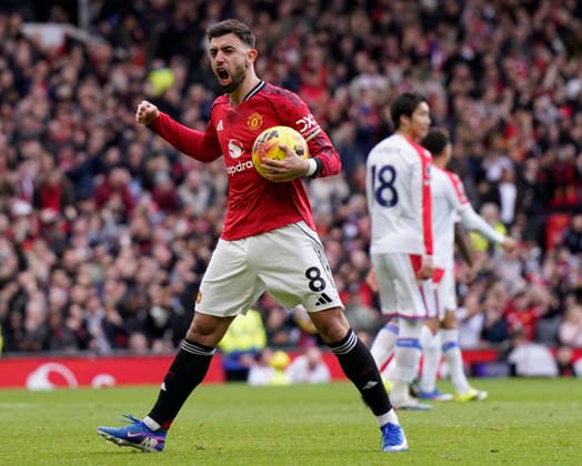 Manchester, England, 1st March 2026. Bruno Fernandes of Manchester United, ManU celebrates scoring from the penalty spot to make it 1-1 during the Manchester United vs Crystal Palace Premier League match at Old Trafford, Manchester. Picture credit should read: Andrew Yates Sportimage EDITORIAL USE ONLY. No use with unauthorised audio, video, data, fixture lists, club league logos or live services. Online in-match use limited to 120 images, no video emulation. No use in betting, games or single club league player publications. SPI_047_AY_Man_Utd_Palace SPI-4566-0046