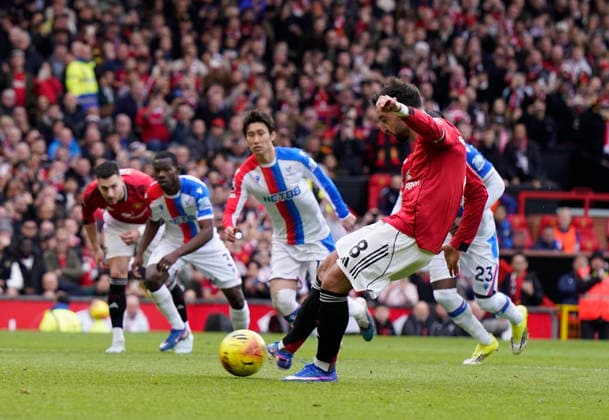 Manchester, England, 1st March 2026. Bruno Fernandes of Manchester United, ManU scores the first goal to equalise during the Manchester United vs Crystal Palace Premier League match at Old Trafford, Manchester. Picture credit should read: Andrew Yates Sportimage EDITORIAL USE ONLY. No use with unauthorised audio, video, data, fixture lists, club league logos or live services. Online in-match use limited to 120 images, no video emulation. No use in betting, games or single club league player publications. SPI_052_AY_Man_Utd_Palace SPI-4566-0054