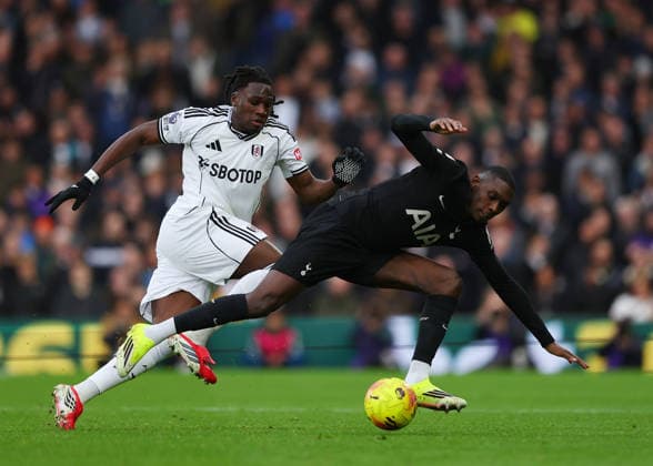 1st March 2026; Craven Cottage, Fulham, London, England; Premier League Football, Fulham versus Tottenham Hotspur; Alex Iwobi of Fulham challenges Randal Kolo Muani of Tottenham Hotspur  JPxFletcher Content restricted for UK based newspaper