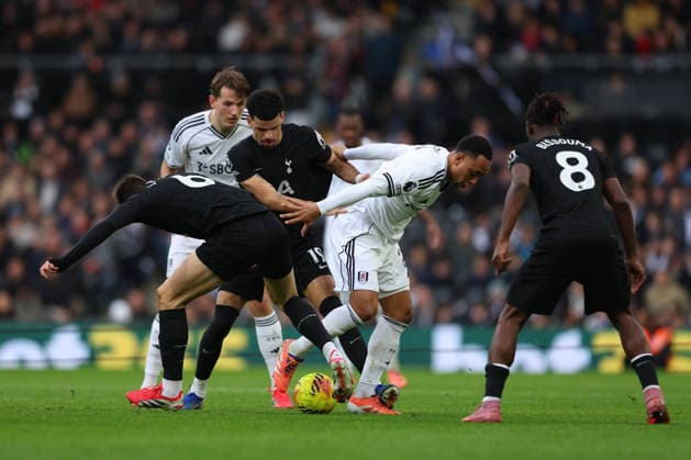 1st March 2026; Craven Cottage, Fulham, London, England; Premier League Football, Fulham versus Tottenham Hotspur; Kenny Tete of Fulham under pressure from Joao Palhinha and Dominic Solanke of Tottenham Hotspur  JPxFletcher Content restricted for UK based newspaper