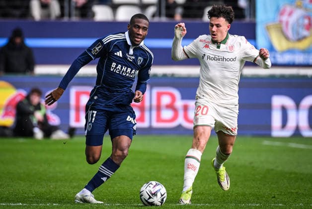 March 1, 2026, Paris, France, France: Adama CAMARA of Paris FC and Tom LOUCHET of Nice during the Ligue 1 match between Paris FC and OGC Nice at Jean-Bouin Stadium on March 01, 2026 in Paris, France. Paris France - ZUMAm308 20260301_zsp_m308_011 Copyright: xMatthieuxMirvillex