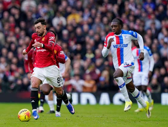 Manchester, England, 1st March 2026. Bruno Fernandes of Manchester United, ManU and Jaydee Canvot of Crystal Palace during the Manchester United vs Crystal Palace Premier League match at Old Trafford, Manchester. Picture credit should read: Andrew Yates Sportimage EDITORIAL USE ONLY. No use with unauthorised audio, video, data, fixture lists, club league logos or live services. Online in-match use limited to 120 images, no video emulation. No use in betting, games or single club league player publications. SPI_081_AY_Man_Utd_Palace SPI-4566-0081