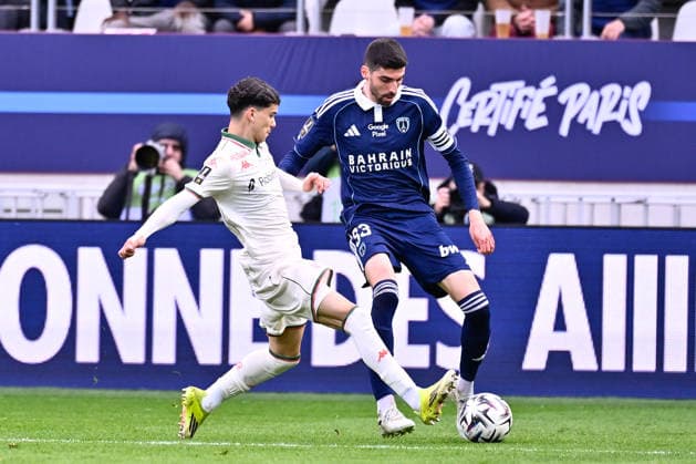 FOOTBALL : Paris FC vs Nice - Ligue 1 - 01 03 2026 Pierre Lees Melou ( 33 - PFC ) and Tom LOUCHET ( 32 - Nice ) during the Ligue 1 match between Paris FC and OGC Nice at Stade Jean Bouin on March 01, 2026 in Paris, France. ( Photo by Federico Pestellini PsnewZ ) - ParisFrance  Copyright: xFedericoxPestelinix