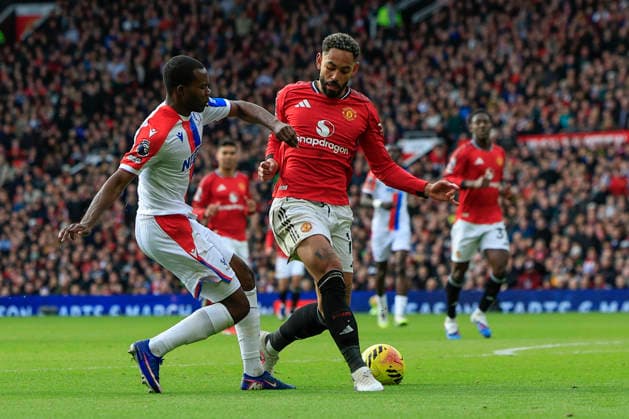Manchester United, ManU v Crystal Palace, Premier League Matheus Cunha (10) of Manchester United is challenged by Tyrick Mitchell (3) of Crystal Palace during the Premier League match between Manchester United and Crystal Palace at Old Trafford, Manchester, UK on 1 March 2026. Manchester Old Trafford Greater Manchester UK Editorial use only DataCo restrictions apply See www.football-dataco.com , Copyright: xConorxMolloyx PSI-23823-0063