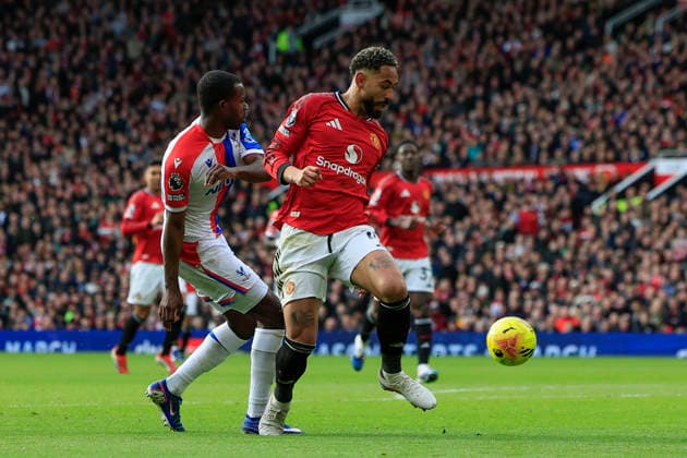 Manchester United, ManU v Crystal Palace, Premier League Matheus Cunha (10) of Manchester United is challenged by Tyrick Mitchell (3) of Crystal Palace during the Premier League match between Manchester United and Crystal Palace at Old Trafford, Manchester, UK on 1 March 2026. Manchester Old Trafford Greater Manchester UK Editorial use only DataCo restrictions apply See www.football-dataco.com , Copyright: xConorxMolloyx PSI-23823-0064