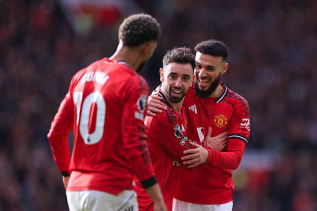 Football - Premier League - Manchester United, ManU v Crystal Palace 1st March 2026 - Premier League - Manchester United v Crystal Palace - Bruno Fernandes of Manchester United (C) celebrates with Noussair Mazraoui of Manchester United (R) and Matheus Cunha of Manchester United (L) - Photo: Simon Stacpoole Offside. Manchester UK Copyright: xSimonxStacpoolexOffside
