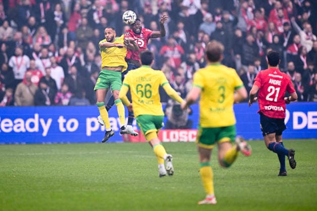 LOSC Lille v FC Nantes - Ligue 1 McDonald s 2025 2026 19 Youssef EL ARABI (fcn) - 18 Chancel MBEMBA (losc) during the Ligue 1 McDonald s match between Lille and Nantes at Stade Pierre Mauroy on March 1, 2026 in Lille, France. Lille France  Copyright: xFEPx 776348307