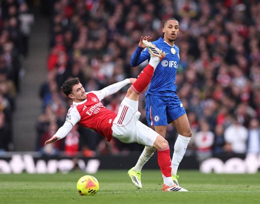 London, England, 1st March 2026. Martin Zubimendi of Arsenal tussles with Joao Pedro of Chelsea during the Arsenal vs Chelsea Premier League match at the Emirates Stadium, London. Picture credit should read: David Klein Sportimage EDITORIAL USE ONLY. No use with unauthorised audio, video, data, fixture lists, club league logos or live services. Online in-match use limited to 120 images, no video emulation. No use in betting, games or single club league player publications. SPI_018_DK_Arsenal_Chelsea SPI-4568-0018