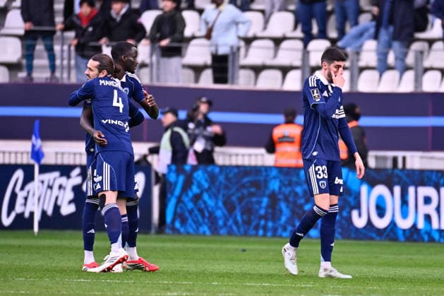 FOOTBALL : Paris FC vs Nice - Ligue 1 - 01 03 2026 Vincent Marchetti ( 4 - PFC ) , Moustapha MBOW ( 5 - PFC ) and Pierre Lees Melou ( 33 - PFC ) celebrate following the Ligue 1 match between Paris FC and OGC Nice at Stade Jean Bouin on March 01, 2026 in Paris, France. ( Photo by Federico Pestellini PsnewZ ) - ParisFrance  Copyright: xFedericoxPestelinix