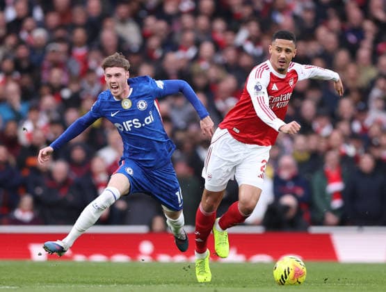 London, England, 1st March 2026. Joao Pedro of Chelsea tussles with William Saliba of Arsenal during the Arsenal vs Chelsea Premier League match at the Emirates Stadium, London. Picture credit should read: David Klein Sportimage EDITORIAL USE ONLY. No use with unauthorised audio, video, data, fixture lists, club league logos or live services. Online in-match use limited to 120 images, no video emulation. No use in betting, games or single club league player publications. SPI_022_DK_Arsenal_Chelsea SPI-4568-0022