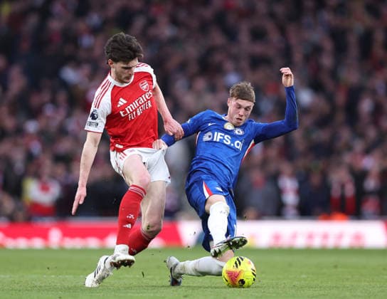 London, England, 1st March 2026. Declan Rice of Arsenal tackles Cole Palmer of Chelsea during the Arsenal vs Chelsea Premier League match at the Emirates Stadium, London. Picture credit should read: David Klein Sportimage EDITORIAL USE ONLY. No use with unauthorised audio, video, data, fixture lists, club league logos or live services. Online in-match use limited to 120 images, no video emulation. No use in betting, games or single club league player publications. SPI_038_DK_Arsenal_Chelsea SPI-4568-0036