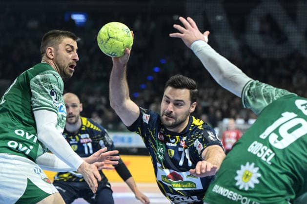 01.03.2026, xlakx, Handball Daikin HBL, Fuechse Berlin - Rhein-Neckar Löwen v.l. Dani Baijens (Rhein-Neckar Loewen) Zweikampf, Duell, Kampf, tackle Berlin