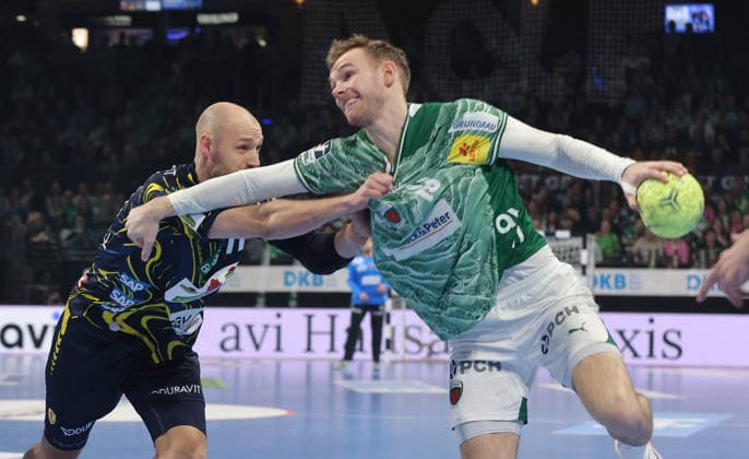 Lukas Sandell, Mathias Gidsel am Ball Zweikampf Spielszene Aktion Handball HBL Bundesliga Herren 23. Spieltag Saison 2025 2026 01.03.2026 Füchse Berlin vs Rhein Neckar Löwen RNL