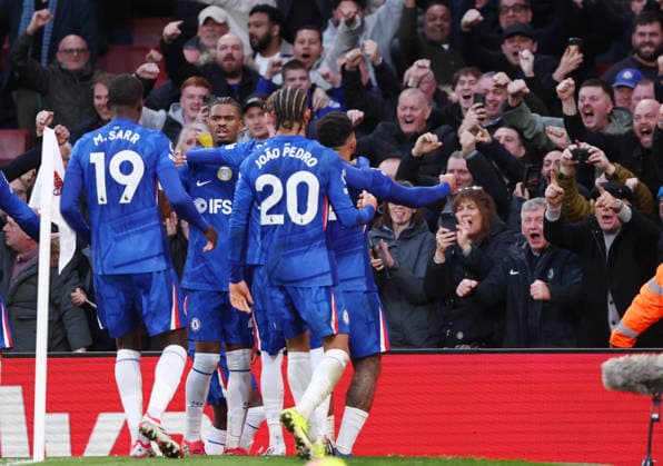 London, England, 1st March 2026. Chelsea players celebrate their equalising goal an own goal by Piero Hincapie of Arsenal during the Arsenal vs Chelsea Premier League match at the Emirates Stadium, London. Picture credit should read: David Klein Sportimage EDITORIAL USE ONLY. No use with unauthorised audio, video, data, fixture lists, club league logos or live services. Online in-match use limited to 120 images, no video emulation. No use in betting, games or single club league player publications. SPI_062_DK_Arsenal_Chelsea SPI-4568-0058
